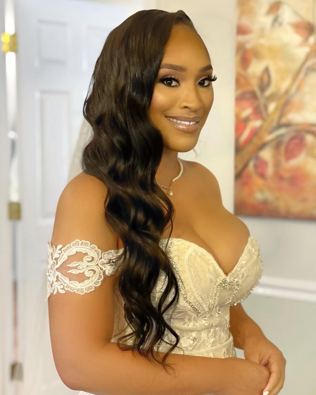 16 Curly Prom Hairstyles That Will Have You Serving Main Character Energy All Night 5 Side-Swept Curls