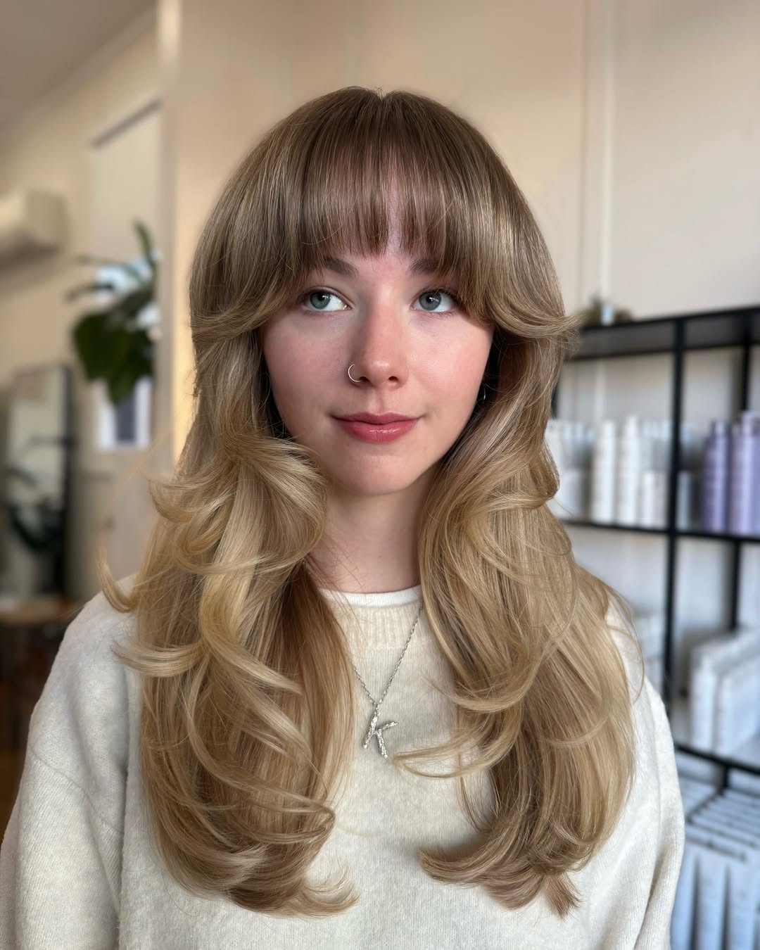 15 Unexpected Hairstyles With Bangs That Are Taking Over Pinterest 3 Soft curtain bangs with loose waves