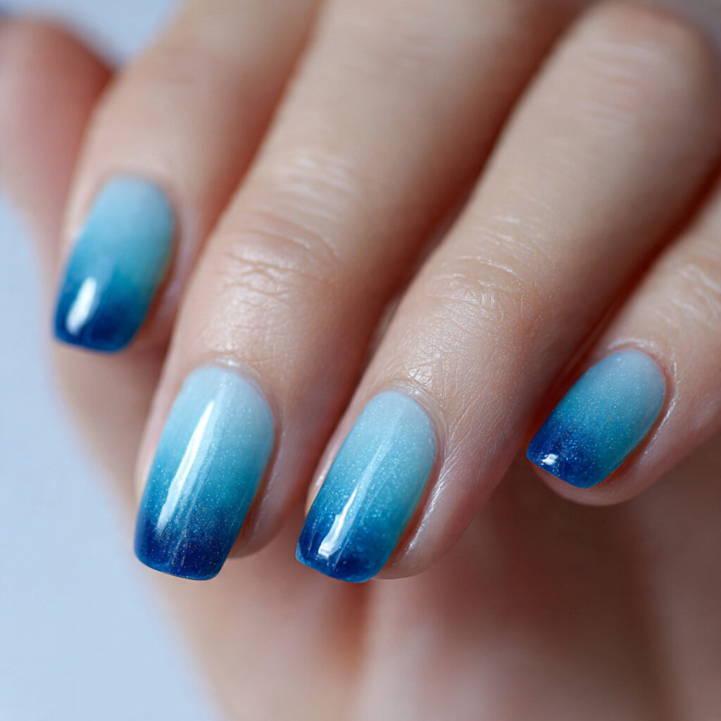 15 Blue Summer Nails That Are Giving Main Character Energy 5 blue ombre fade nails