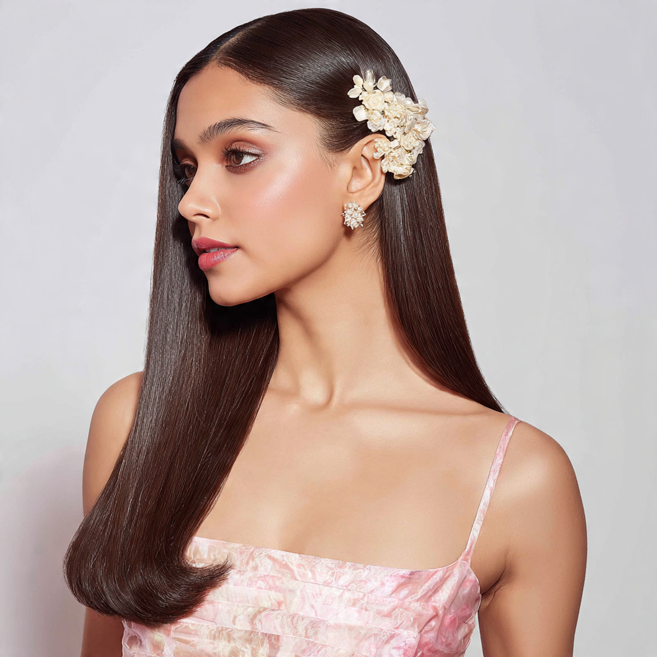 16 Flower Girl Hairstyle Ideas That Are Straight-Up Adorable (and Actually Easy to Do) 12 Sleek Straight Hair with Floral Clip