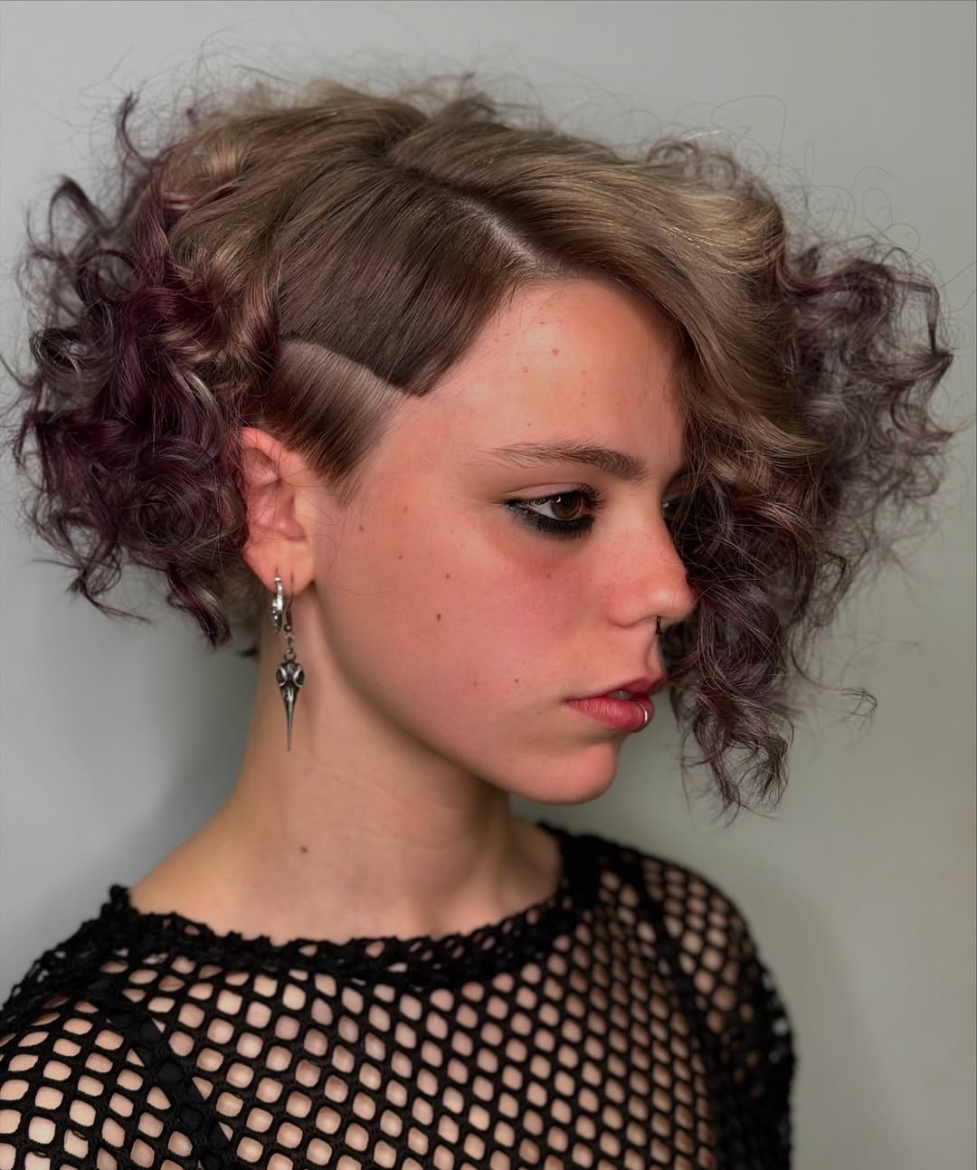 16 Curly Bob Hairstyles That Are Basically Your Hair’s Main Character Era 5 Asymmetrical Curly Bob