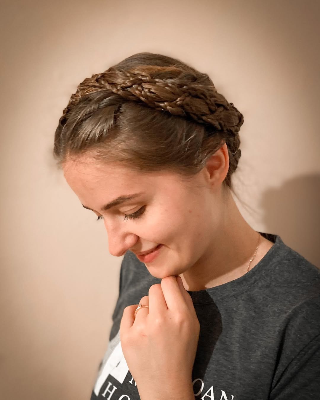 13 Christmas Hairstyles Ideas That’ll Make You the Main Character This Holiday Season 5 Braided Crown
