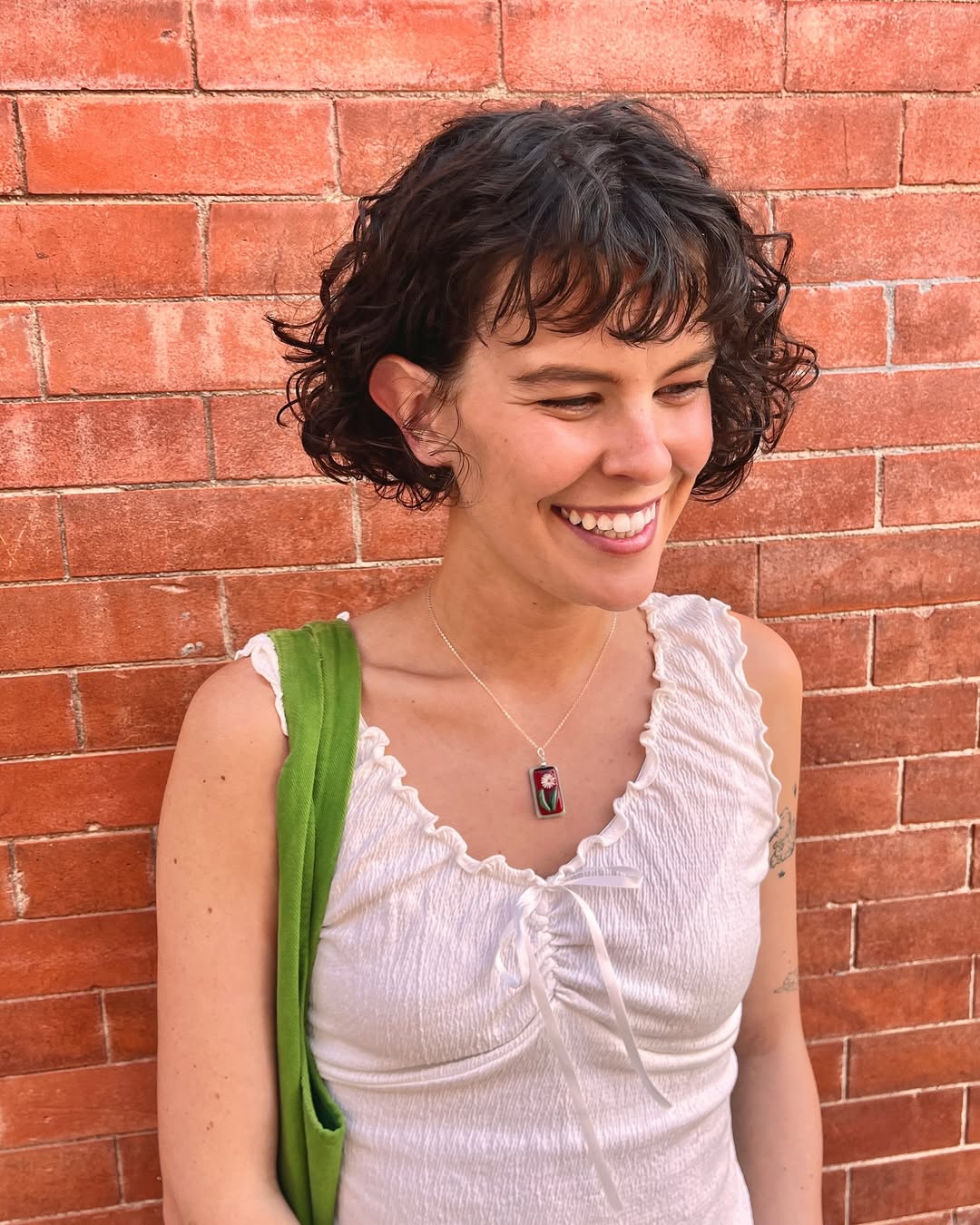 16 Curly Bob Hairstyles That Are Basically Your Hair’s Main Character Era 6 Chin-Length Curly Bob