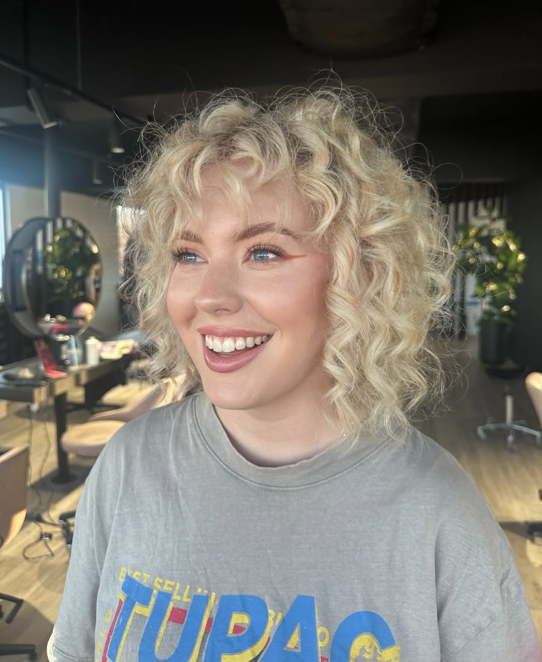 16 Curly Bob Hairstyles That Are Basically Your Hair’s Main Character Era 4 Curly Bob with Bangs