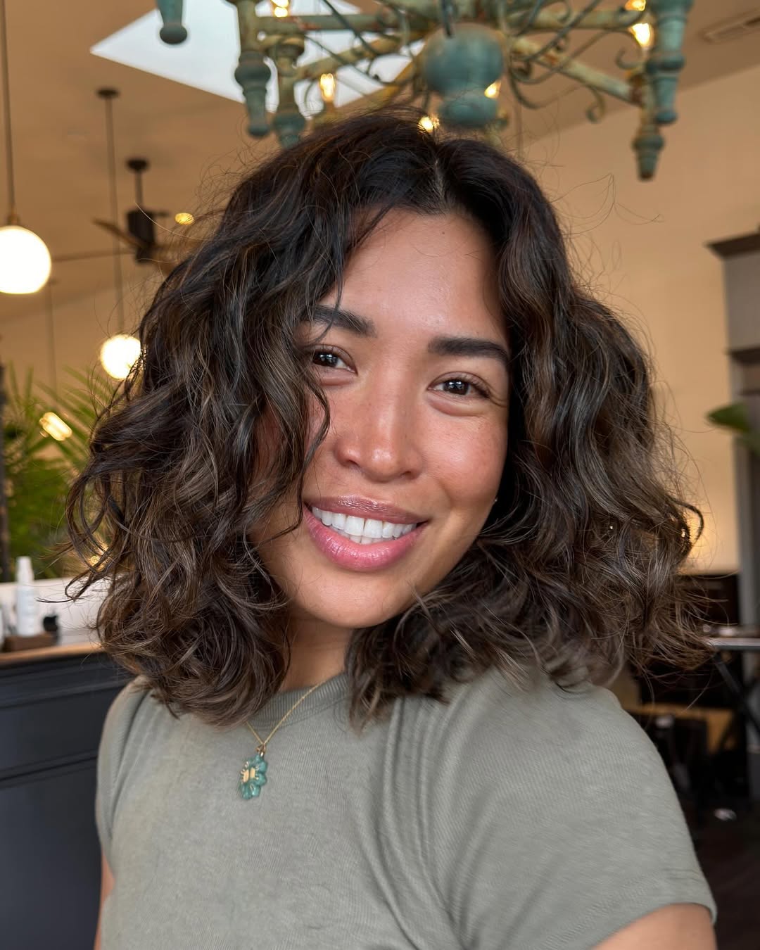 15 Curly Hairstyles for Medium Hair That Will Make You Ditch Your Straightener (Finally) 8 Curly Lob with Bangs