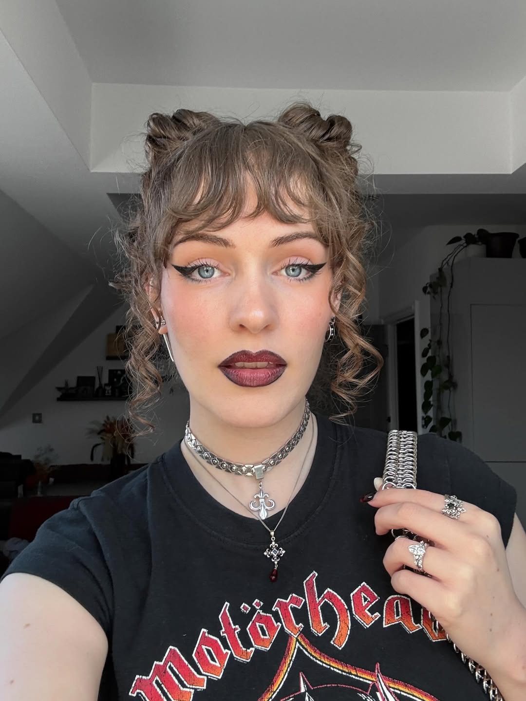 15 Curly Updo Hairstyles That Will Instantly Elevate Your Look (No Salon Required) 11 Curly Space Bun Updo