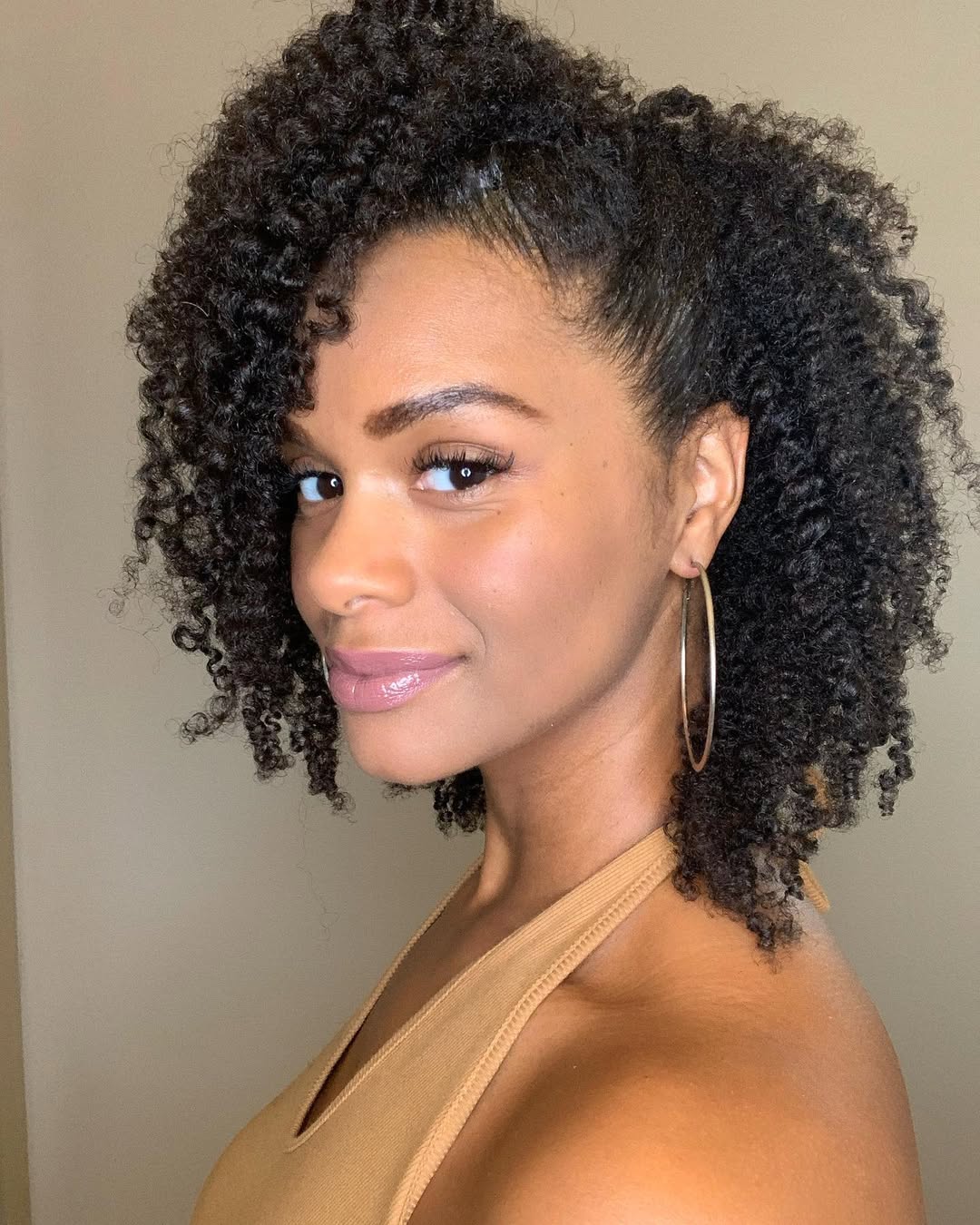 14 Natural Curly Hairstyles That Will Instantly Upgrade Your Vibe (No Heat, No Stress) 6 Defined Twist-Out