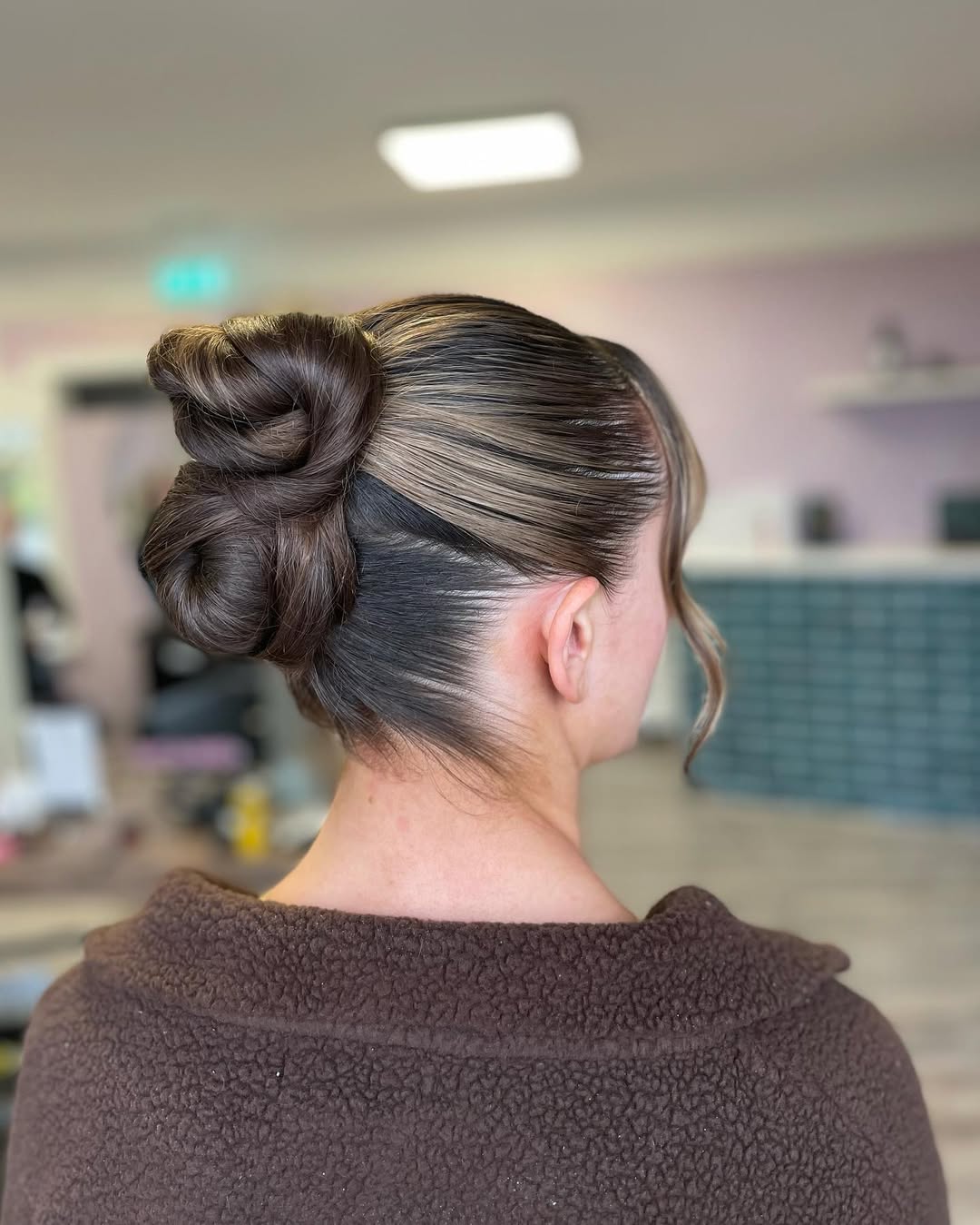 15 Curly Updo Hairstyles That Will Instantly Elevate Your Look (No Salon Required) 9 Double Bun Updo