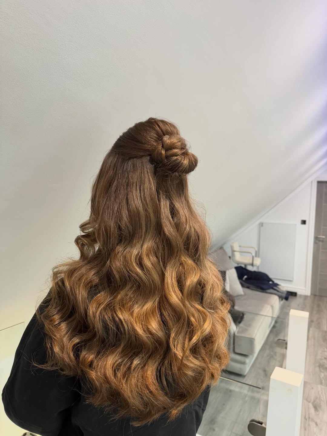 15 Curly Updo Hairstyles That Will Instantly Elevate Your Look (No Salon Required) 6 Half-Up Curly Bun