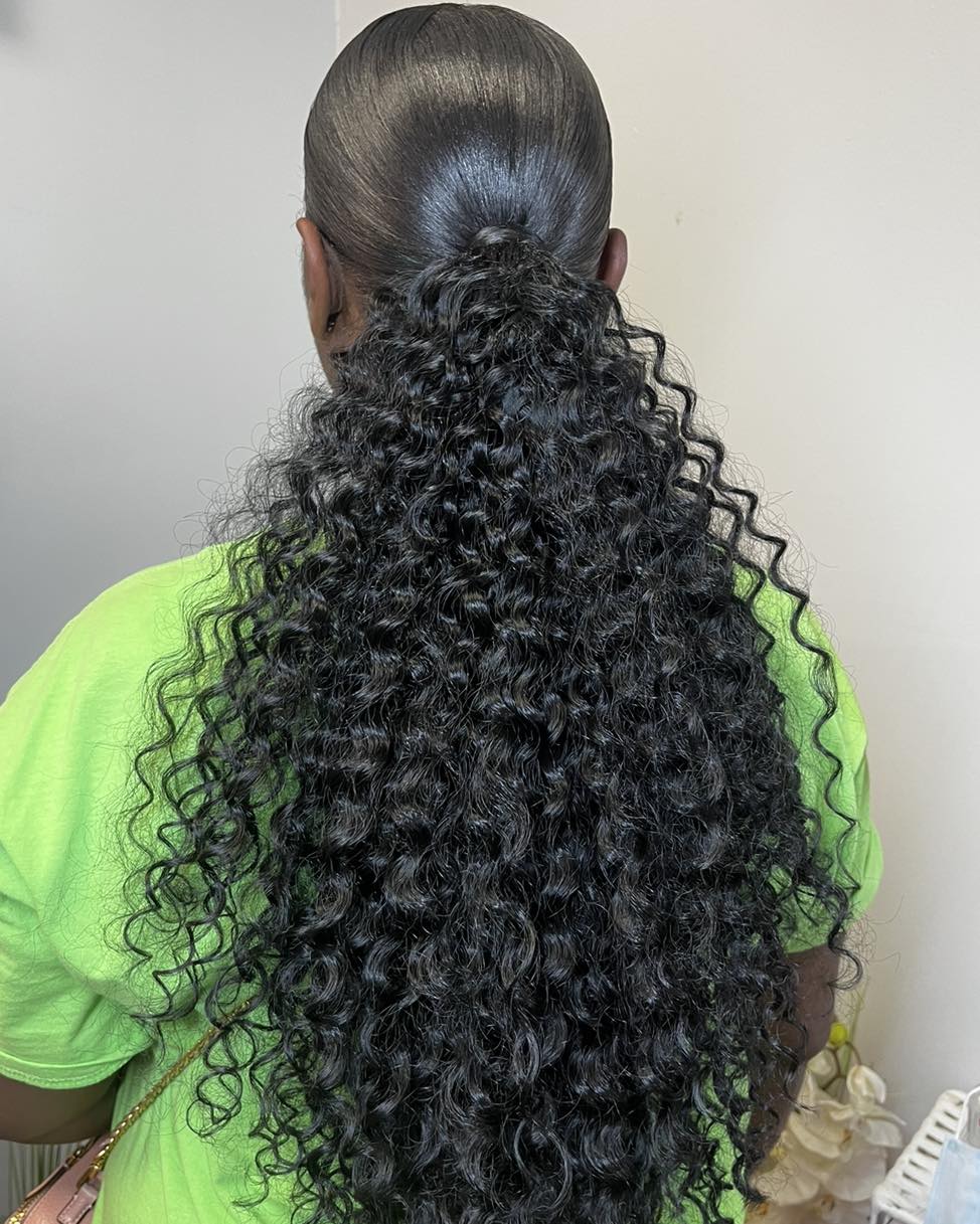 15 Curly Hairstyles for School That Will Make You Want to Ditch the Snooze Button 6 Low Curly Ponytail