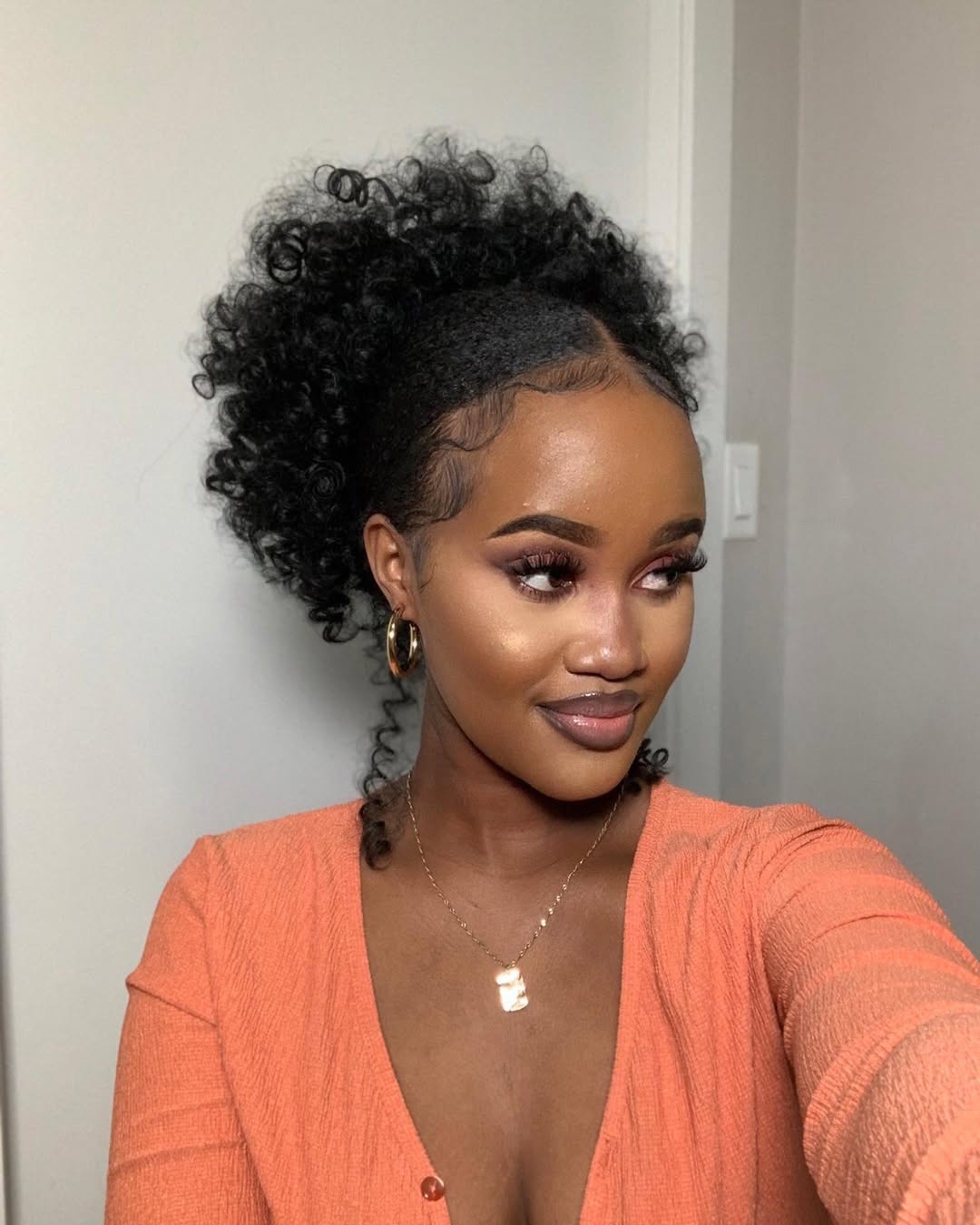15 Curly Updo Hairstyles That Will Instantly Elevate Your Look (No Salon Required) 12 Low Puff Updo