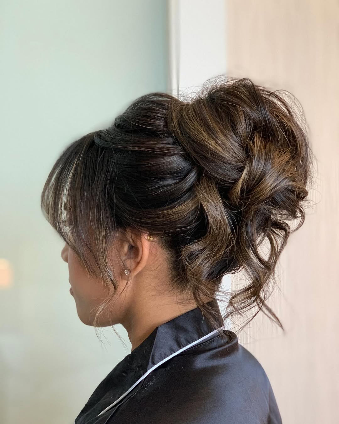 15 Curly Updo Hairstyles That Will Instantly Elevate Your Look (No Salon Required) 2 Messy High Bun