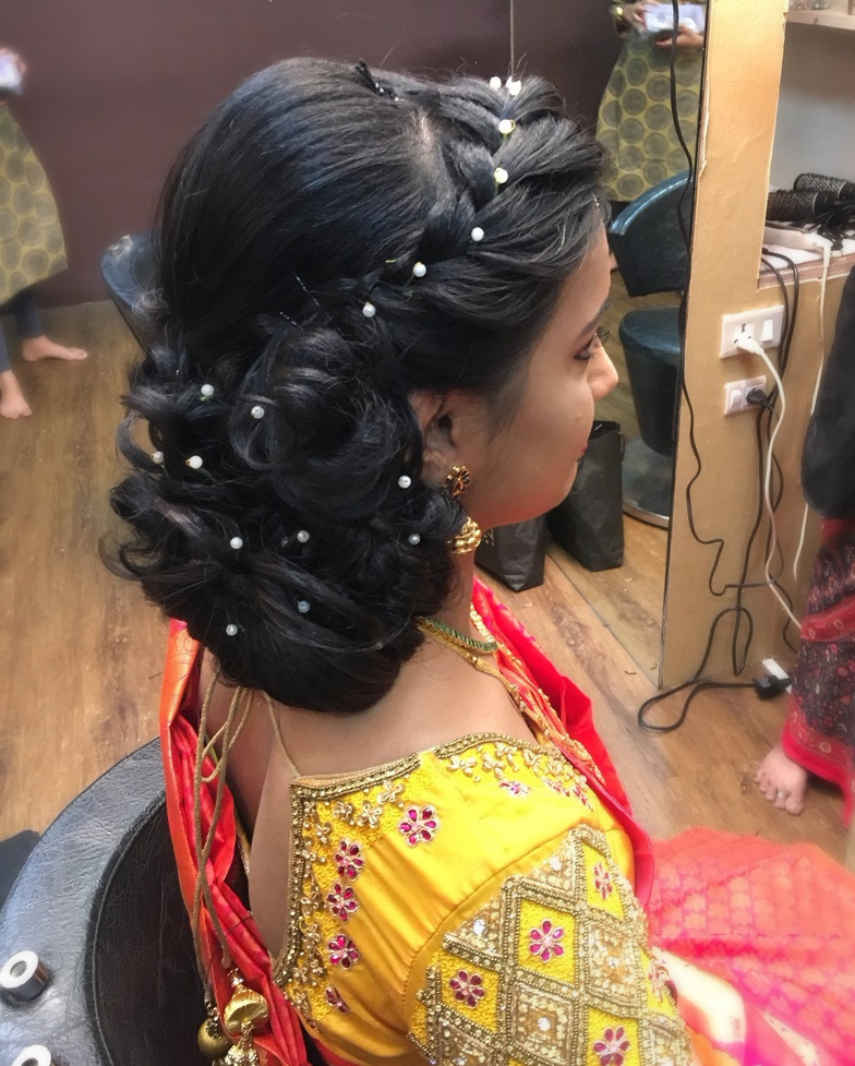 16 Quinceañera Hairstyles Ideas That Will Have Everyone Asking “Wait… Who Did Your Hair?!” 11 Messy Textured Bun