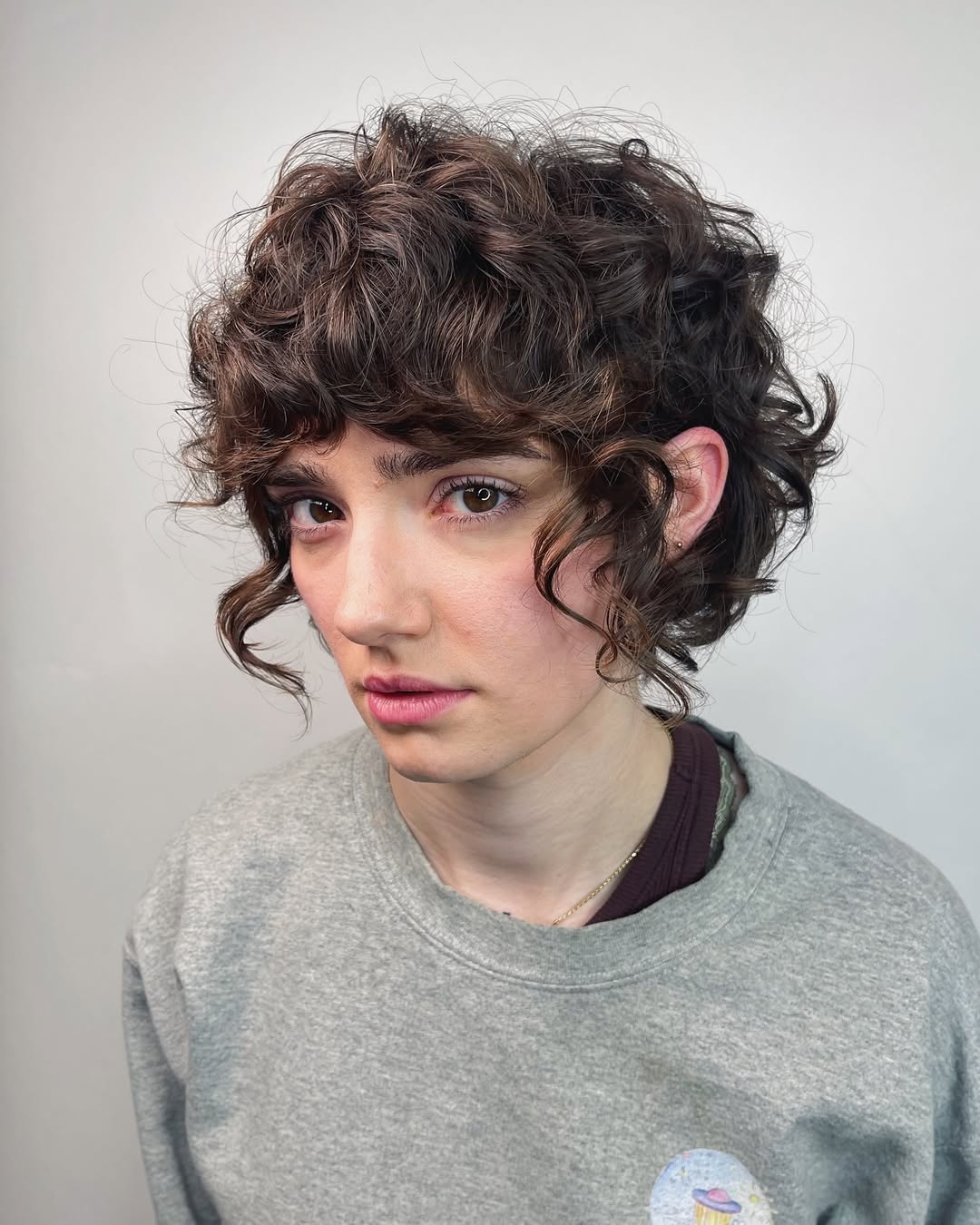 16 Curly Bob Hairstyles That Are Basically Your Hair’s Main Character Era 12 Shaggy Curly Bob