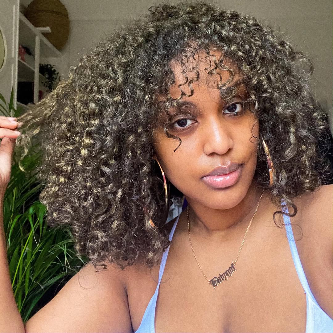 15 Curly Hairstyles for School That Will Make You Want to Ditch the Snooze Button 16 Slicked Edges + Curly Puff