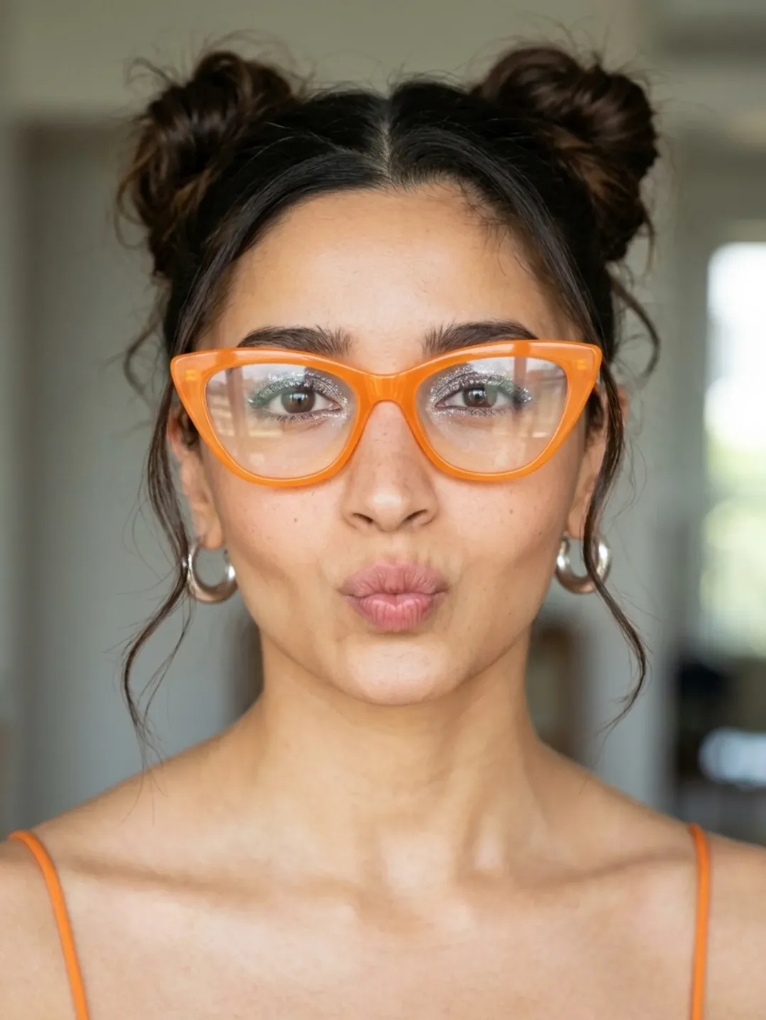 16 Easy Curly Hairstyles That Make You Look Effortlessly Put-Together (Even on Lazy Days) 8 Space Buns