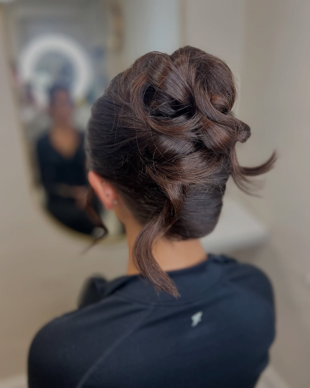 15 Curly Bun Hairstyles That Instantly Upgrade Your Look (No Effort, All Style) 11 Twisted Curly Bun