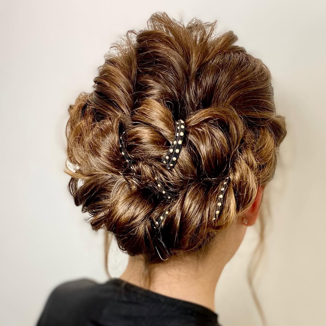 15 Curly Updo Hairstyles That Will Instantly Elevate Your Look (No Salon Required) 13 Twisted Halo Updo