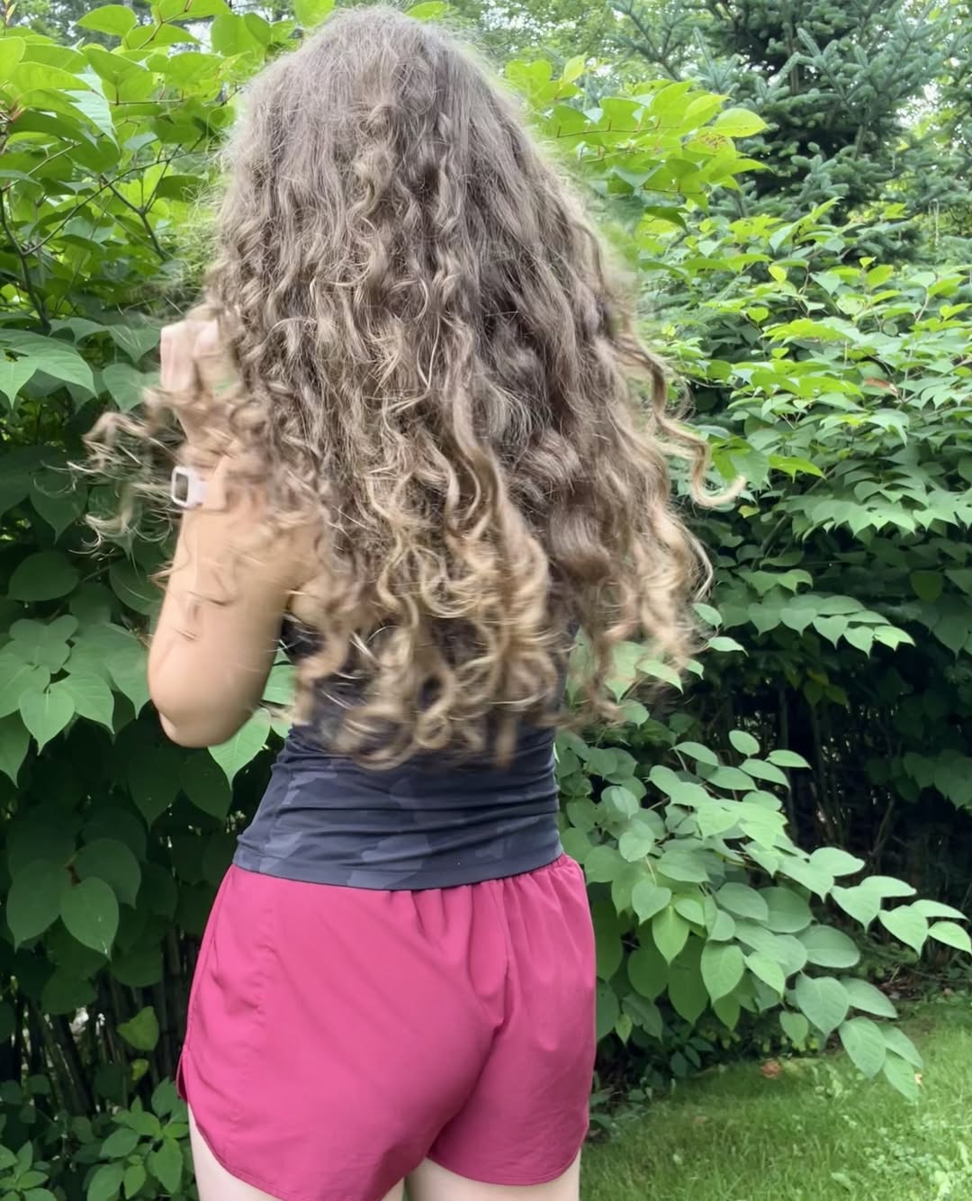 16 Quinceañera Hairstyles Ideas That Will Have Everyone Asking “Wait… Who Did Your Hair?!” 7 Voluminous Curly Updo