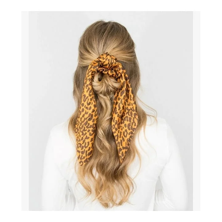 15 Boho Hairstyle Ideas That Are Giving Effortless Cool-Girl Energy in 2026 12 Boho Ponytail with Scarf