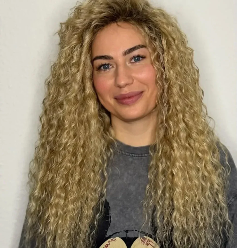 15 Cheer Hairstyle Ideas That’ll Make You Look Game-Day Ready in Seconds 11 Crimped Cheer Hair