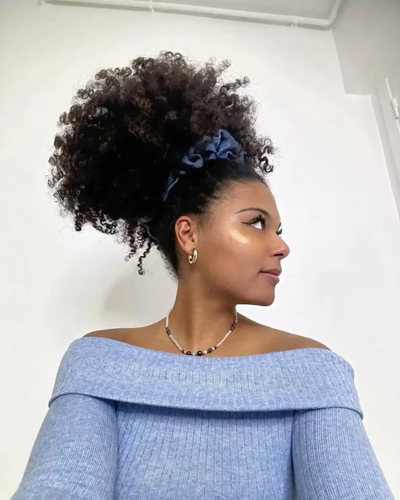 20 Dance Hairstyles That Stay Slaying From the First Beat to the Last Bow 9 Curly High Puff