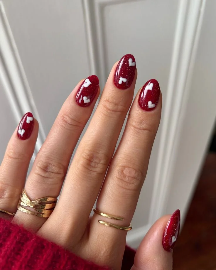 16 Dark Red Nails That Look Expensive, Moody, and Way Too Good to Ignore 11 Dark Red Nails with Tiny Hearts