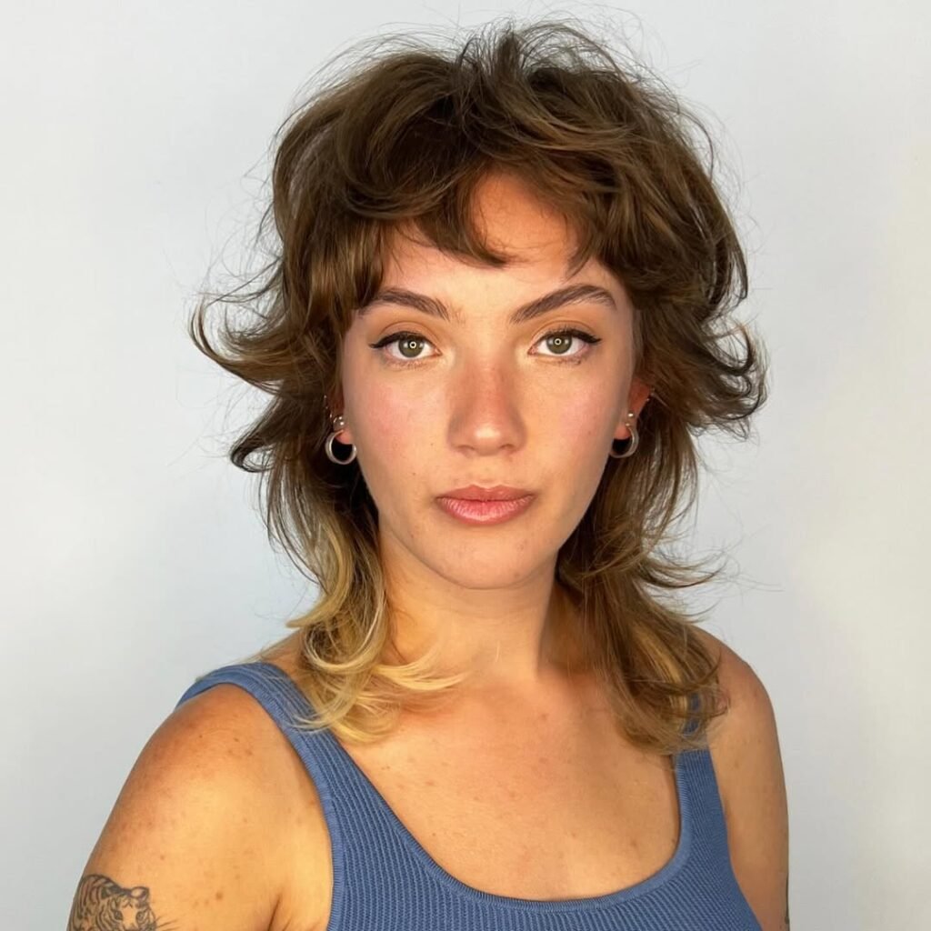 16 Retro Hairstyle Ideas That Are Giving Main-Character Energy in 2026 2 Feathered Farrah Fawcett Layers 1
