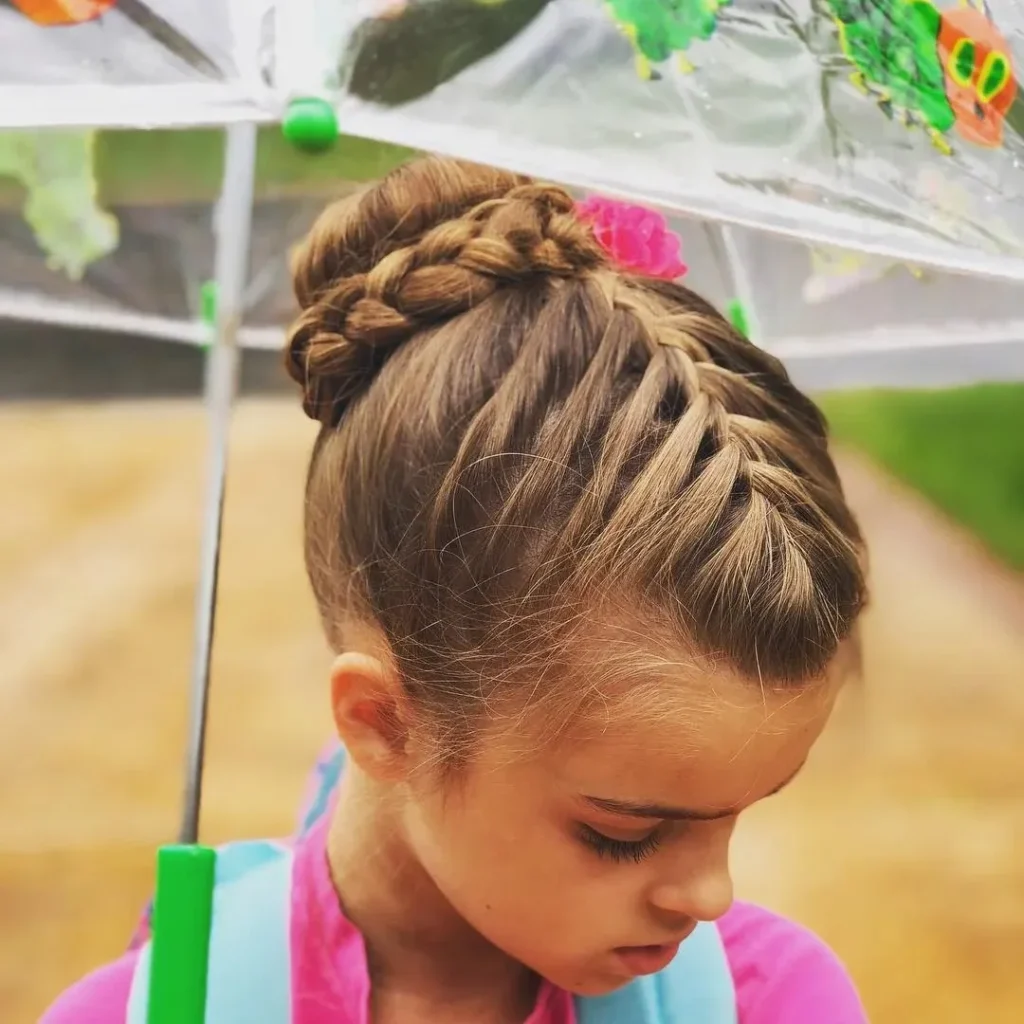 15 Cheer Hairstyle Ideas That’ll Make You Look Game-Day Ready in Seconds 14 French Braid Into Bun