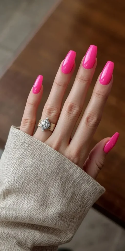 15 Pink Nail Ideas That Are So Good, You'll Want to Cancel Your Plans Just to Stare at Them 3 Hot Pink Power Move