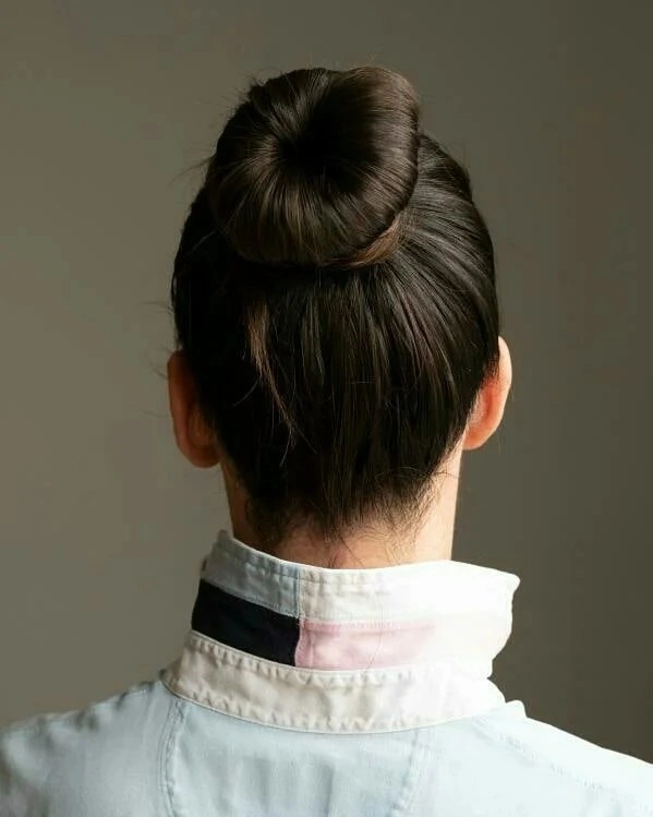 20 Dance Hairstyles That Stay Slaying From the First Beat to the Last Bow 19 Mega Slick Low Bun with Baby Hairs