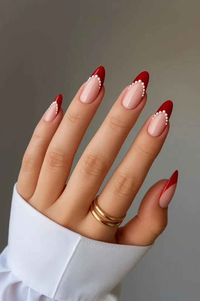 15 Trending Red Nails That Make Your Hands Look Instantly Expensive 16 Red Coquette Bow Nails