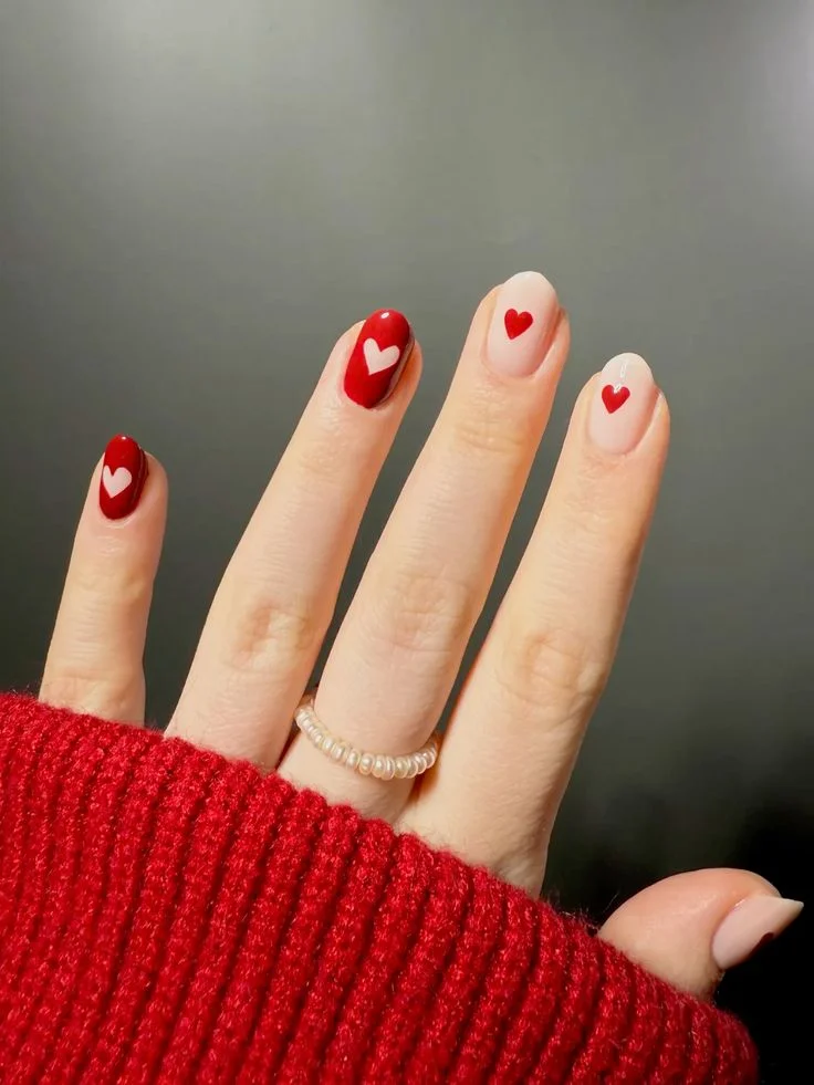 15 Trending Red Nails That Make Your Hands Look Instantly Expensive 11 Red Heart Nail Art