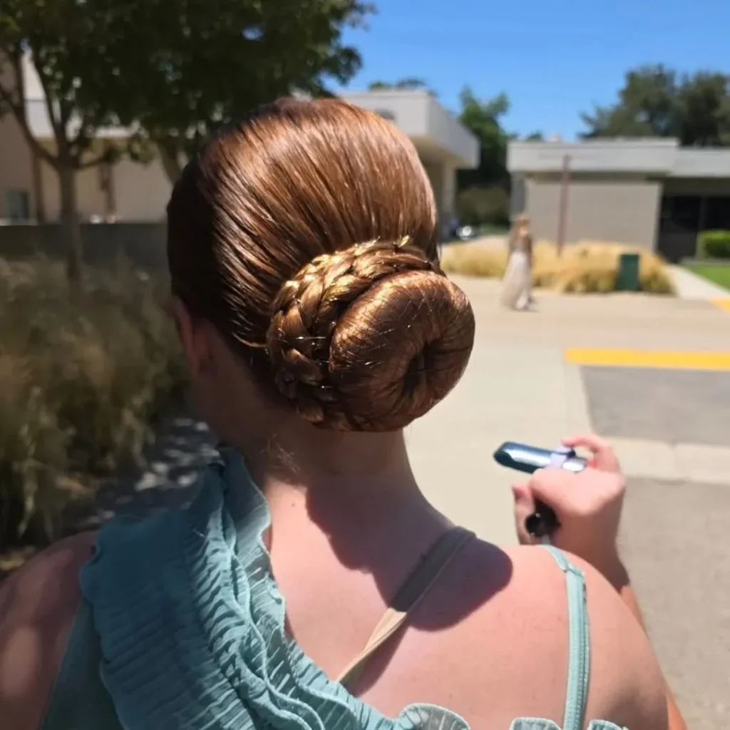 20 Dance Hairstyles That Stay Slaying From the First Beat to the Last Bow 12 Ribbon or Fabric Wrapped Bun
