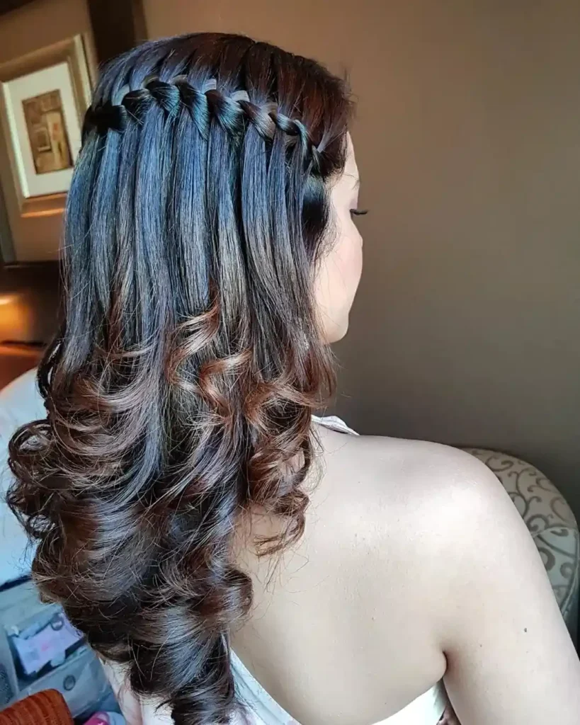 15 Boho Hairstyle Ideas That Are Giving Effortless Cool-Girl Energy in 2026 13 Romantic Waterfall Braid