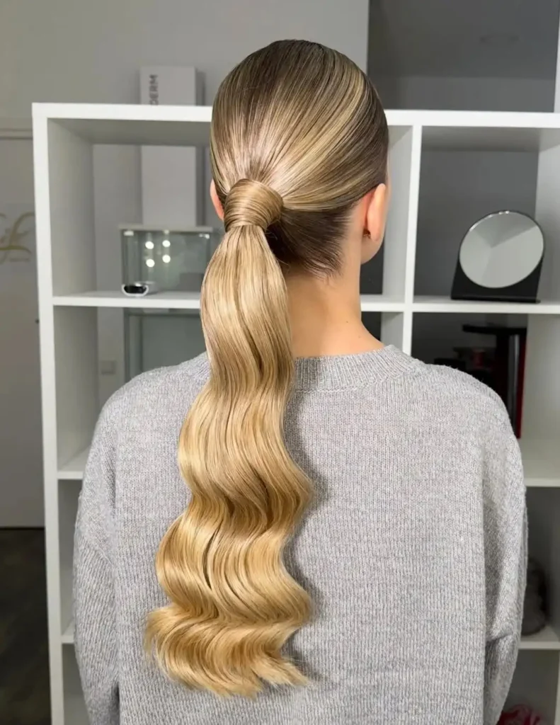 16 Relaxed Hairstyle Ideas That'll Make You Look Effortlessly Stunning (No Salon Required) 6 Sleek Low Ponytail With a Flyaway Moment