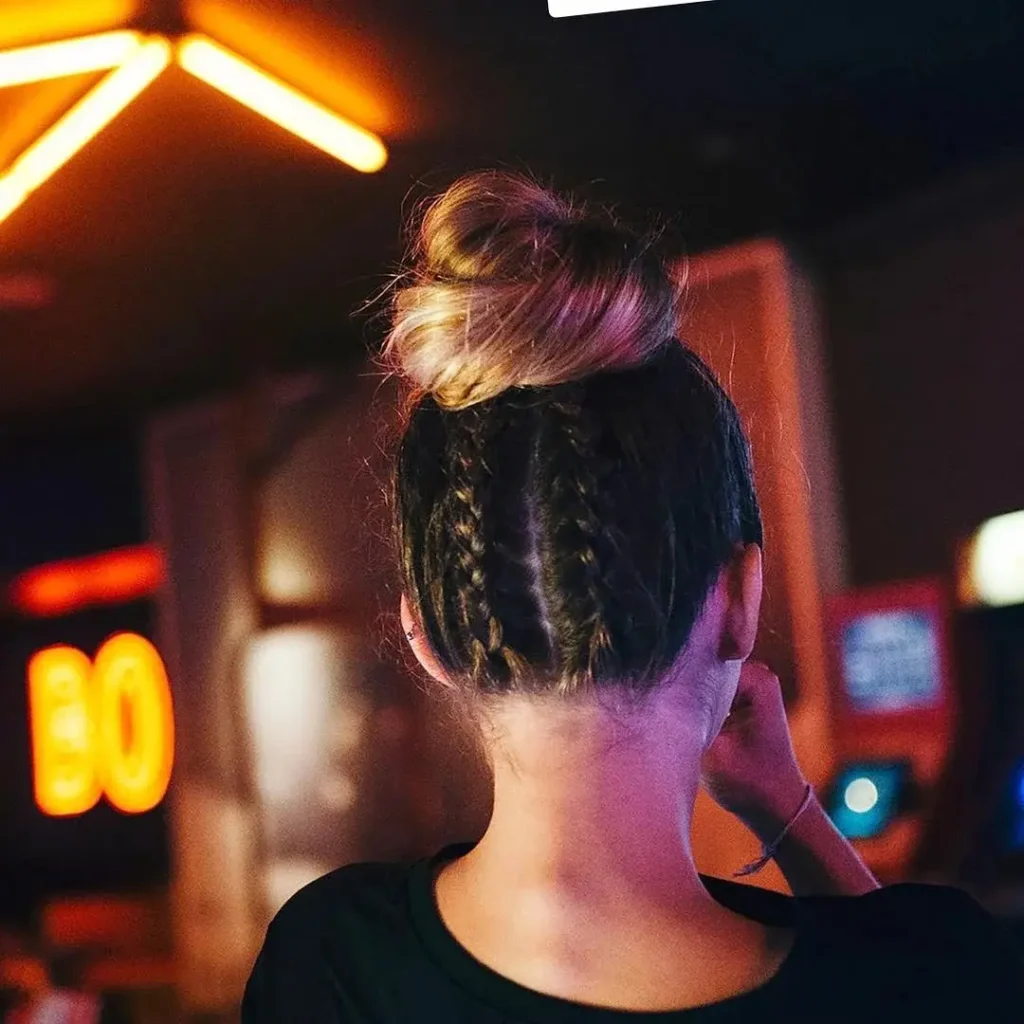 20 Dance Hairstyles That Stay Slaying From the First Beat to the Last Bow 13 Slicked Back Braid Bun