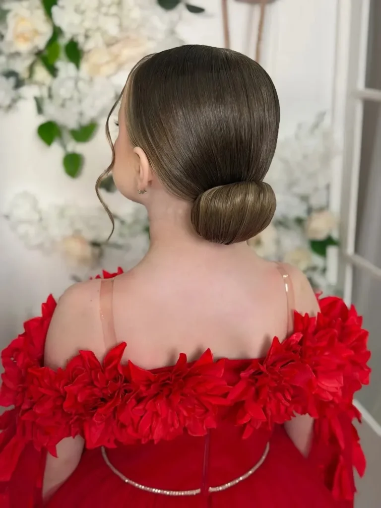 16 Vacation Hairstyles That'll Make You Look Effortlessly Gorgeous (Even After a 10-Hour Flight) 13 Slicked Back Bun