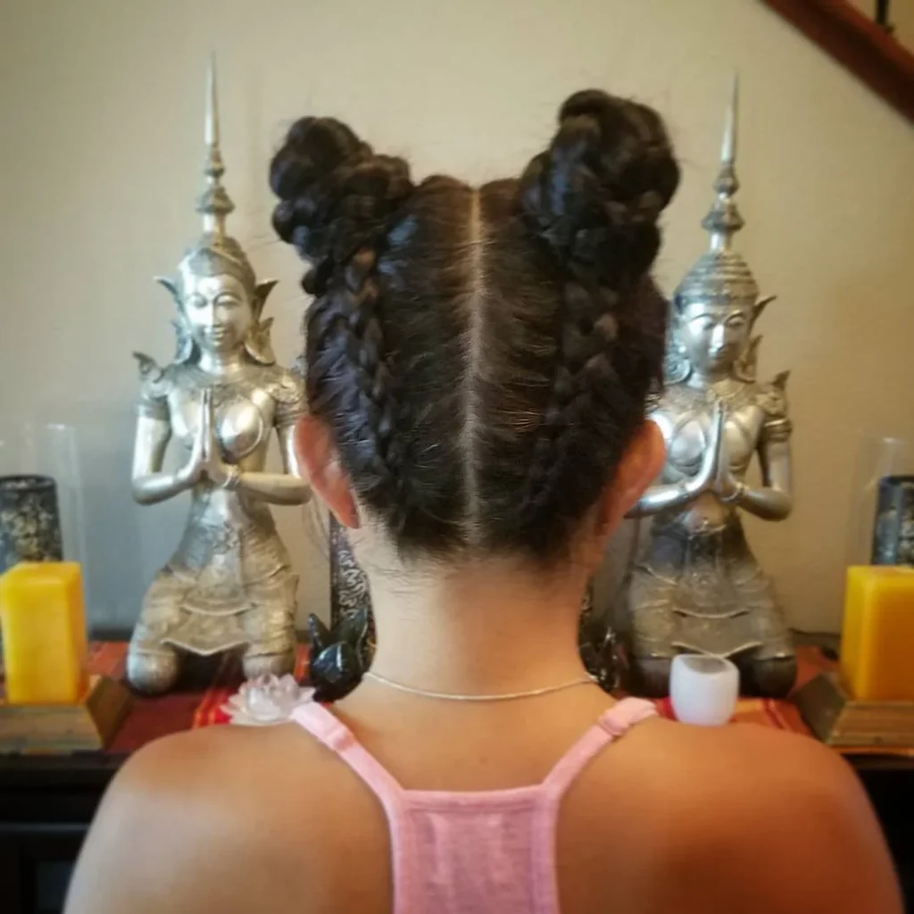 15 Boho Hairstyle Ideas That Are Giving Effortless Cool-Girl Energy in 2026 10 Space Buns with Braided Details