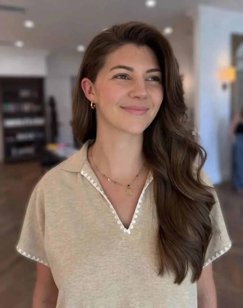 17 Down Hairstyles Ideas That'll Make You Want to Ditch the Ponytail Forever 12 Straight and Sleek with a Deep Side Part