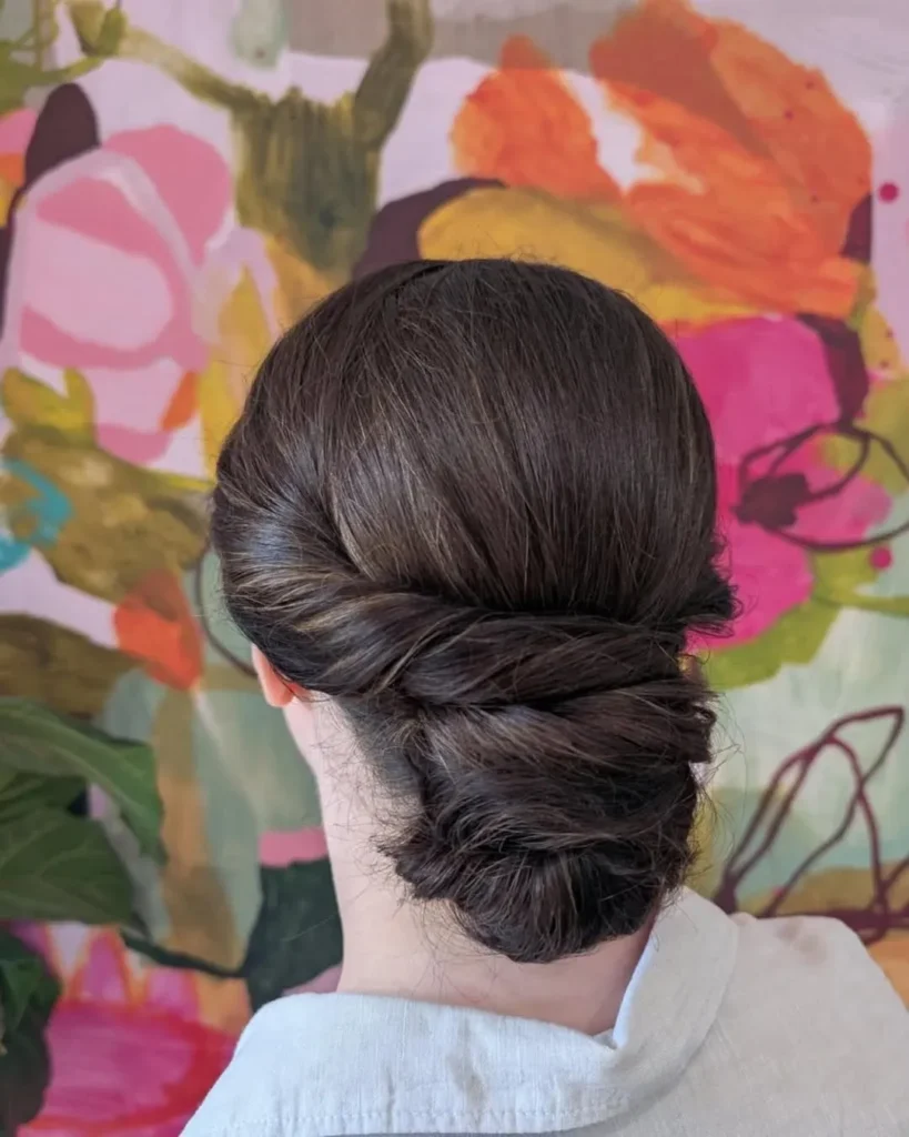 16 Gymnastics Hairstyles That'll Have You Flipping With Confidence (Literally) 4 The Low Bun with a Tight Twist