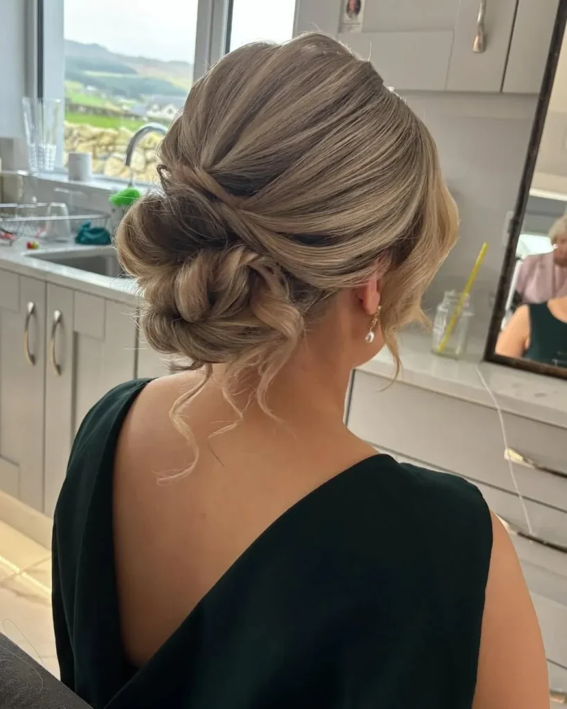 15 Lazy Hairstyle Ideas That Make You Look Put-Together in Under 10 Minutes 2 The Messy Low Bun