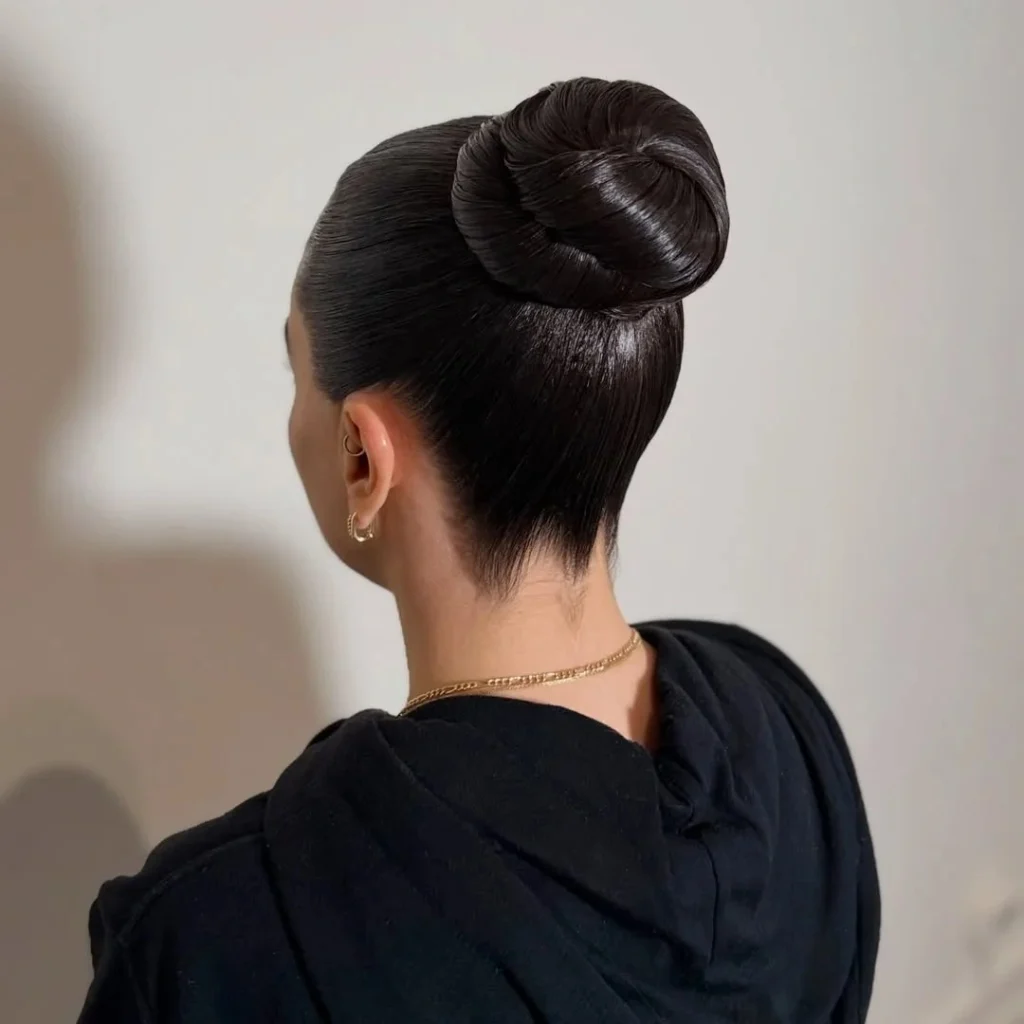 20 Dance Hairstyles That Stay Slaying From the First Beat to the Last Bow 2 The Sleek High Bun