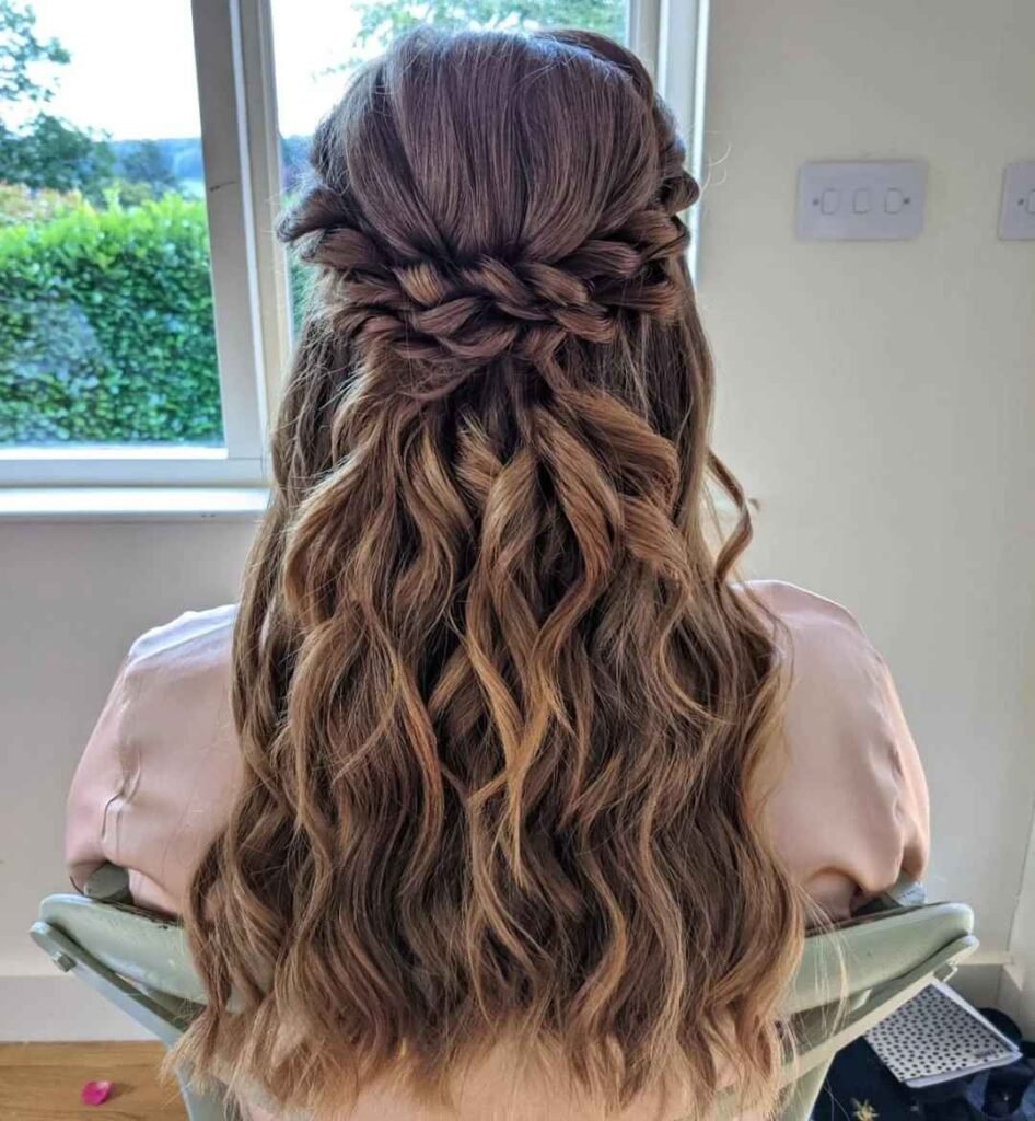 15 Boho Hairstyle Ideas That Are Giving Effortless Cool-Girl Energy in 2026 15 Twisted Half Up Hairstyle