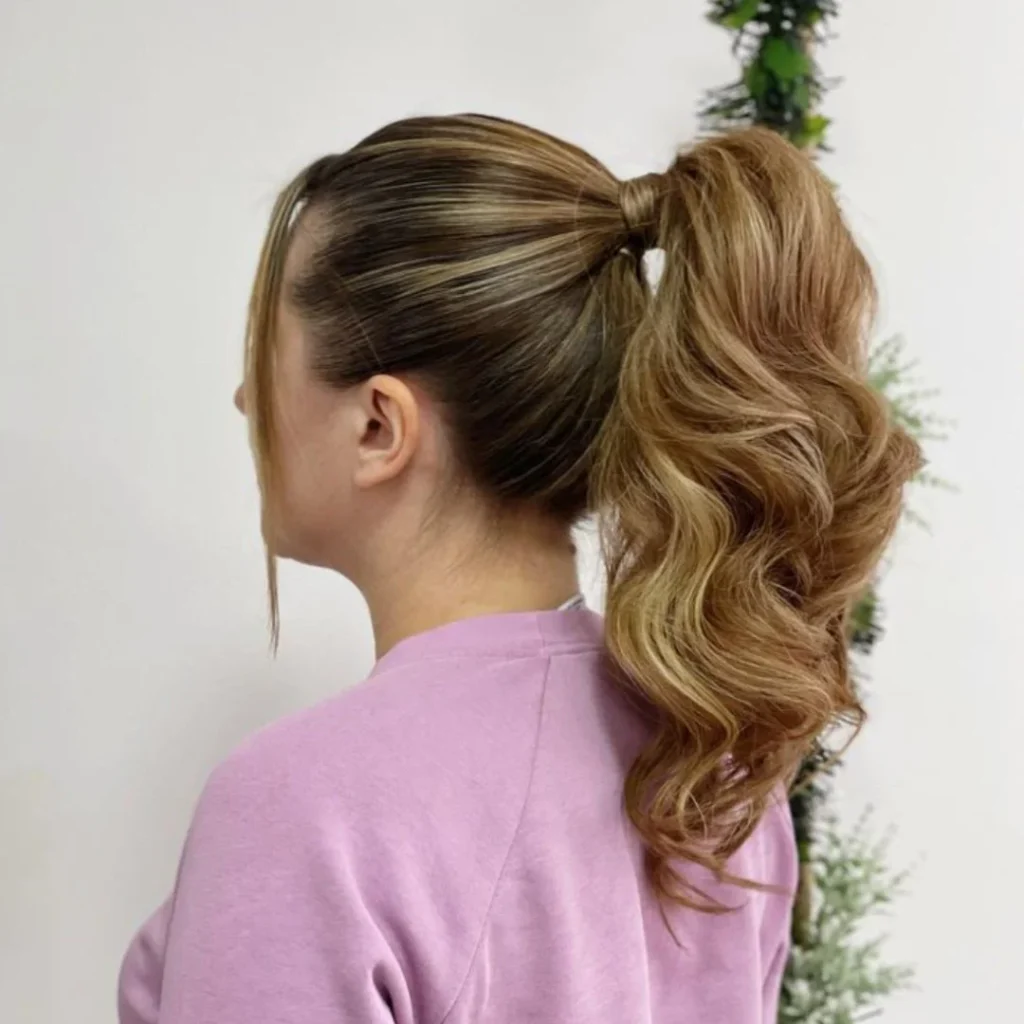 15 Cheer Hairstyle Ideas That’ll Make You Look Game-Day Ready in Seconds 15 Voluminous Ponytail With Teased Crown