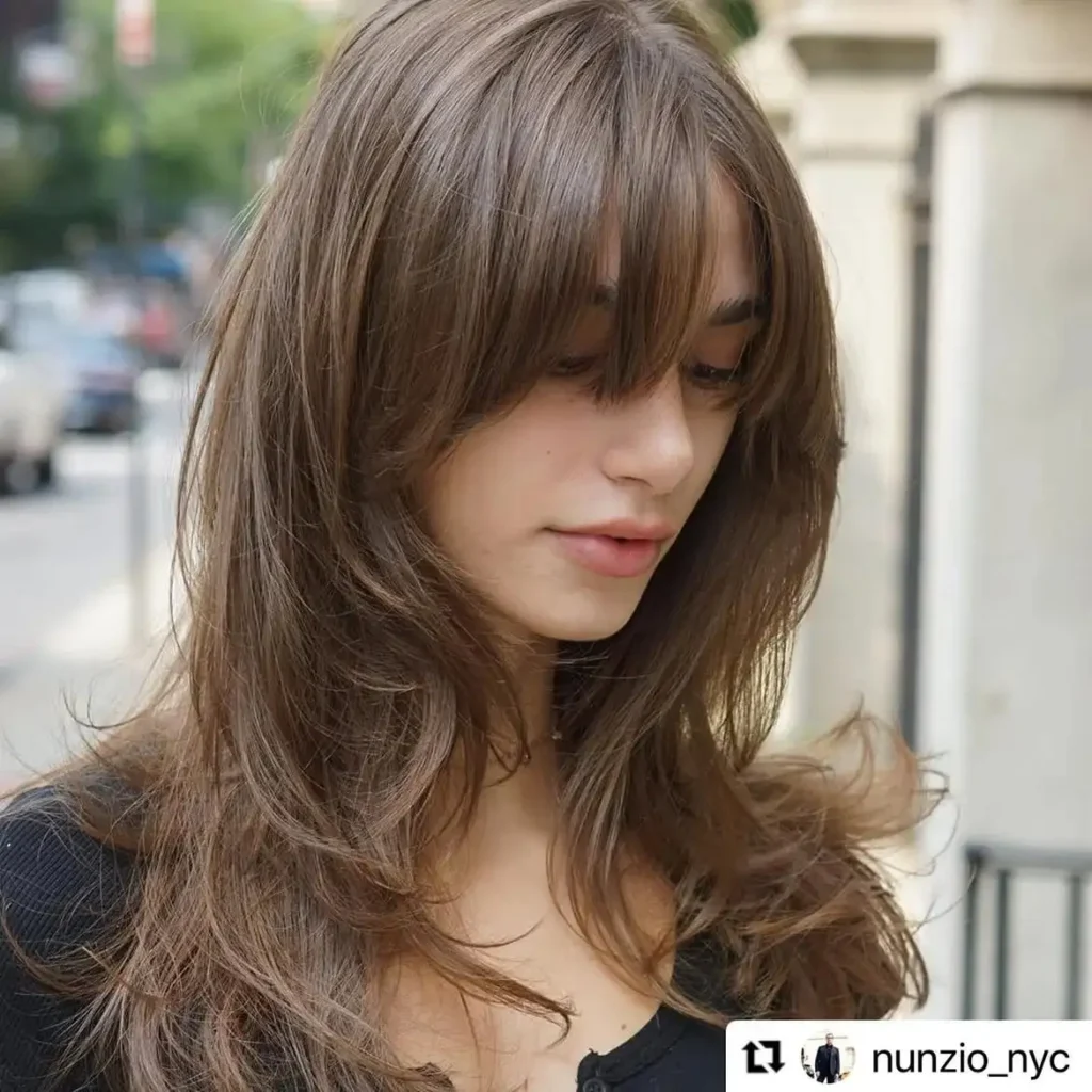 18 Bang Hairstyles That'll Make You Want to Grab Scissors ASAP 7 Arched Bangs