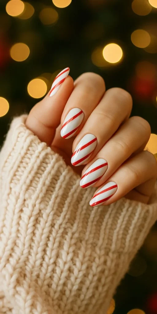 Make Your Holiday Mani Feel Magical With These 15 Christmas Nail Ideas 4 Candy Cane Striped Nails