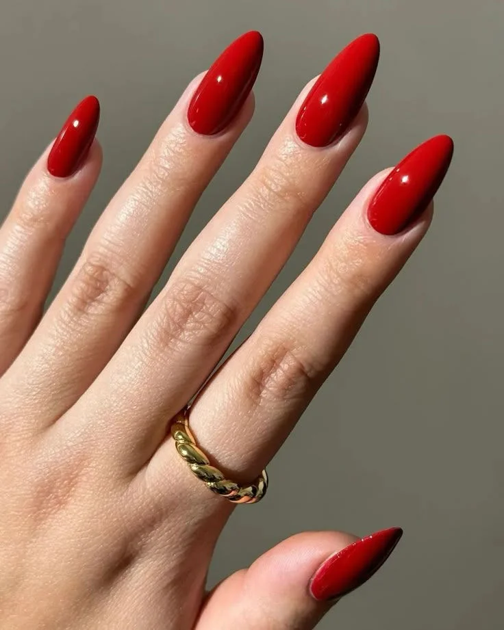 Make Your Holiday Mani Feel Magical With These 15 Christmas Nail Ideas 2 Classic Red Christmas Nails