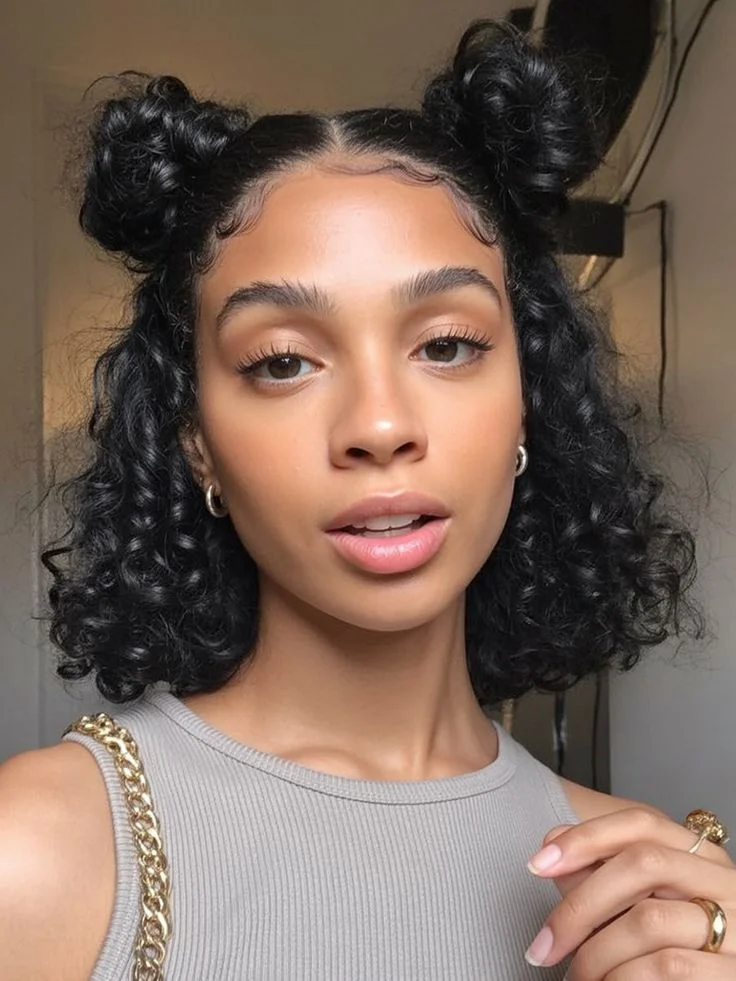 19 Cute Hairstyles for Curly Hair That'll Make You Fall in Love With Your Curls All Over Again 5 Curly Space Buns