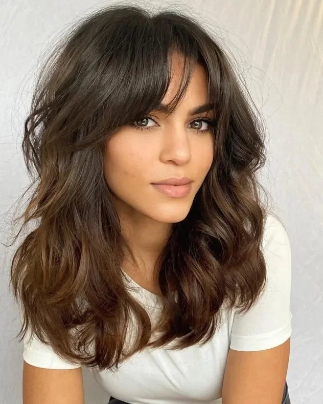 18 Bang Hairstyles That'll Make You Want to Grab Scissors ASAP 12 Face Framing Bangs